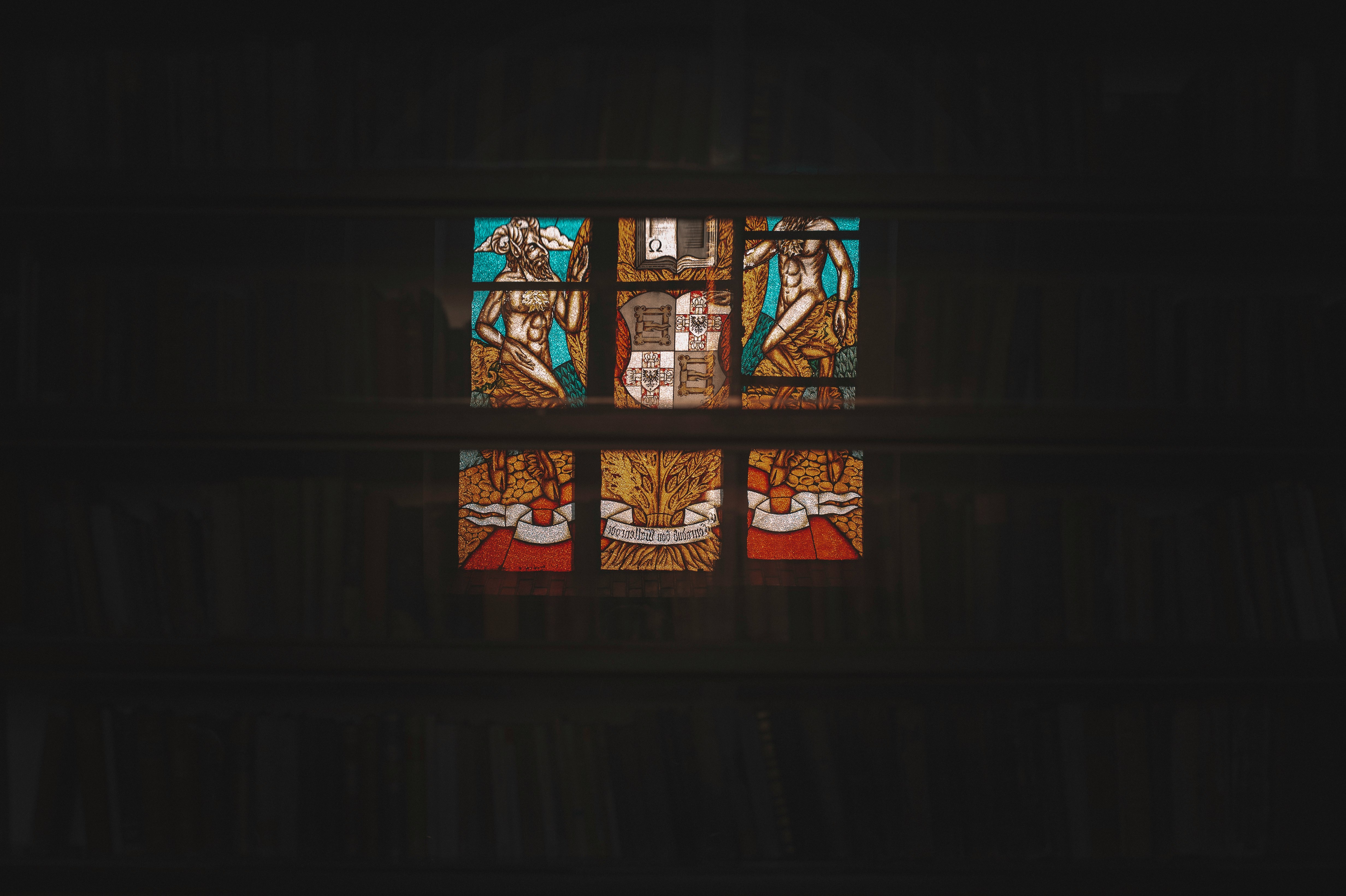 blue red and yellow floral glass window